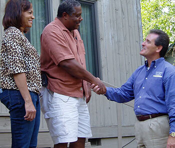 Photo of Mr. Rogers with happy customers