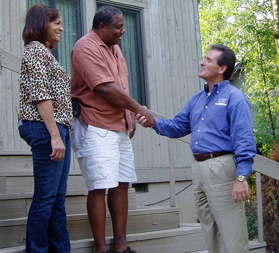 Photo of Mr. Rogers with happy customers